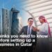 Business setup in Qatar – Important considerations for company formation, with a business professional and a Qatari man discussing opportunities against the Doha skyline.
