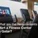 Row of modern treadmills in a fitness center with a text overlay asking 'What are the Requirements to Start a Fitness Center in Qatar?'